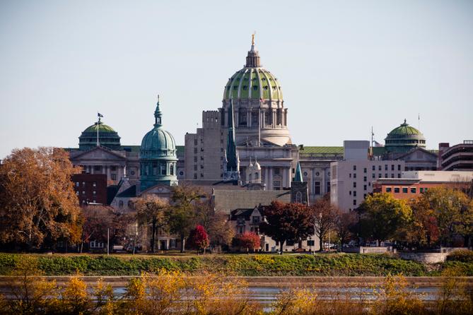 The Pennsylvania Capitol in Harrisburg is seen in fall.