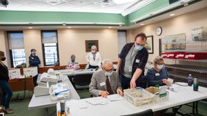 Volunteers opened and sorted mail-in ballots while poll watchers observed in Erie County on Nov. 3. The Erie County Board of Elections unanimously voted to certify its election results Thursday without any fanfare.