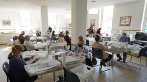 Mail ballots are sorted and counted by workers on Election Day at Northampton County Courthouse in Easton.