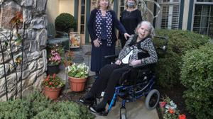 Christi Marshall, left with her sisters Karen Greene, center and sister Laura Hervey at Hershey's Mill in West Chester. Laura depends on her sisters in the event of a pipeline problem for her evacuation, Thursday, October 8, 2020