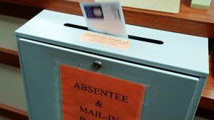 A ballot is deposited into a box at the county clerk's office in Erie. A newly approved resolution is meant to bar groups of people openly carrying firearms from gathering near polling places and drop boxes. A ballot is deposited into a box at the county clerk's office in Erie. A newly approved resolution is meant to bar groups of people openly carrying firearms from gathering near polling places and drop boxes.