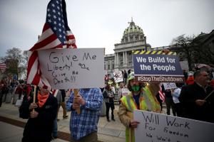 Protesters gather outside the Capitol Complex. They are calling for Gov. Tom Wolf to reopen up the state's economy during the coronavirus outbreak. Protesters gather outside the Capitol Complex. They are calling for Gov. Tom Wolf to reopen up the state's economy during the coronavirus outbreak.