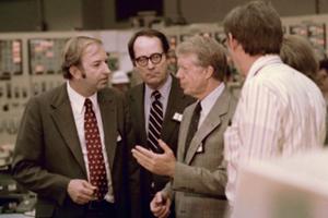 FILE - In this April 1, 1979, file photo President Jimmy Carter talks in the control room of Three Mile Island nuclear plant in Middletown, Pa., with from left, Harold Denton, Director of the U.S. Nuclear Agency, Pennsylvania Gov. Dick Thornburgh, and an unidentified control room employee. Thornburgh died Thursday, Dec. 31, 2020 at a retirement community facility outside Pittsburgh, his son David said. (AP Photo, File) FILE - In this April 1, 1979, file photo President Jimmy Carter talks in the control room of Three Mile Island nuclear plant in Middletown, Pa., with from left, Harold Denton, Director of the U.S. Nuclear Agency, Pennsylvania Gov. Dick Thornburgh, and an unidentified control room employee. Thornburgh died Thursday, Dec. 31, 2020 at a retirement community facility outside Pittsburgh, his son David said. (AP Photo, File)