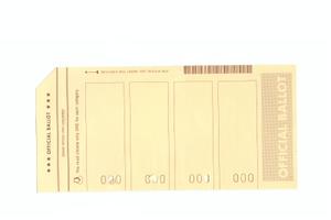 This stock photo shows an example of a "hanging chad," created by an incompletely punched hole on a ballot. This stock photo shows an example of a "hanging chad," created by an incompletely punched hole on a ballot.