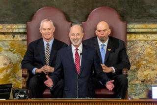 Pennsylvania Gov. Tom Wolf delivers his 2020-21 budget address in the state House of Representatives as Speaker Mike Turzai, left, and Lt. Gov. John Fetterman, right, look on, on Feb. 4, 2020, in Harrisburg, Pa Pennsylvania Gov. Tom Wolf delivers his 2020-21 budget address in the state House of Representatives as Speaker Mike Turzai, left, and Lt. Gov. John Fetterman, right, look on, on Feb. 4, 2020, in Harrisburg, Pa