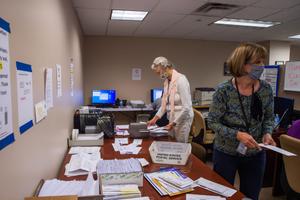 Erie County employees are seen here organizing mail ballots during the 2020 presidential election. “We would have had to go to county taxpayers several times without this,” Erie County Executive Director Kathy Dahlkemper wrote of the grant money. Erie County employees are seen here organizing mail ballots during the 2020 presidential election. “We would have had to go to county taxpayers several times without this,” Erie County Executive Director Kathy Dahlkemper wrote of the grant money.
