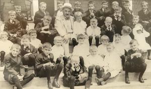 Milton Hershey and the early students of the school that bears his name in 1913. Milton Hershey and the early students of the school that bears his name in 1913.