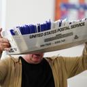 Workers sort mail ballots on Nov. 5, 2024, at Northampton County Courthouse in Easton, Pennsylvania.