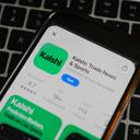 An ad for the prediction market app Kalshi is displayed on a mobile phone Thursday, April 16, 2026.