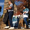 Voters walk past “Vote Here” signs in Pittsburgh’s Squirrel Hill neighborhood on Nov. 5, 2024.