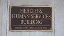 A placard outside the Pennsylvania Health & Human Services building in Harrisburg.