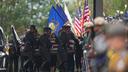 Pallbearers carry the coffin of a slain officer during funeral services for Northern York County Regional Police detectives in Red Lion, PA