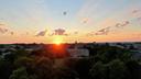 The sun over Old Main on Penn State’s University Park campus