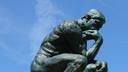 Auguste Rodin’s bronze sculpture titled The Thinker or Le Penseur.