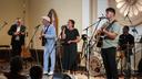 Conrad Fisher, Rose Stoltzfus and Ben Stoltzfus perform at Ragamuffin Hall in McCoysville, Pa., Saturday, April 25, 2026.