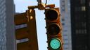 A green stoplight illustrates a story about the infamous Pittsburgh Left.
