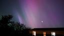 The northern lights and moon in Somerset County.