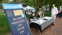 Sarah Rafacz and Michelle Mertz at the Spotlight PA State College booth at Centre Gives Fest in 2023.