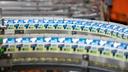 Milk cartons on a production line.