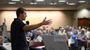 Conor Lamb speaks to the crowd at a town hall-style event organized by progressive groups at Central Penn College, Sunday, June 22, 2025, in Enola, PA.