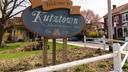 A sign for the borough of Kutztown that says ‘ a most agreeable town’ in faded letters
