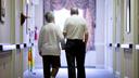An older couple in the hall of a nursing home in Easton, PA.