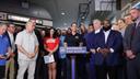 Gov. Josh Shapiro, fellow Democrats, SEPTA officials, and others call for transit funding in Philadelphia in August, 2025.