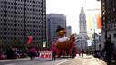 Handlers walk the turkey balloon down the Benjamin Franklin Parkway in Philadelphia during the Thanksgiving Day Parade.