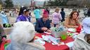 Bethlehem Mayor J. William Reynolds signs bookmarks at a tree decorating event on Nov. 21, 2025.