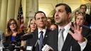 Then-state Rep. Mark Rozzi (D., Berks) speaks at a news conference in the Pennsylvania Capitol in October 2018. He is flanked by then-Attorney General Josh Shapiro, lawmakers, and abuse victims.