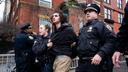 Police detain Emir Balat after he attempted to detonate an improvised explosive device during a counterprotest against far right influencer Jake Lang staging an anti-Islam protest outside Gracie Mansion, Saturday, March 7, 2026, in New York