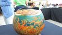 A dried gourd decorated with underwater scenery.