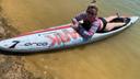 Amanda Parezo rides a paddleboard