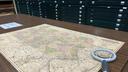 A map of Pennsylvania and a magnifying glass