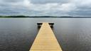 A fishing pier reaches into the mouth of the Appomattox River in Hopewell, VA.