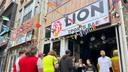 Fans arrive to watch a Champion league soccer match between Arsenal and Paris Saint-Germain at the Lion Sports Bar, in Philadelphia.