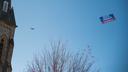 A VotesPA.com banner is flown behind a plane over downtown Erie on Election Day 2022.