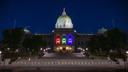LGBTQ pride colors are displayed on the state Capitol in Harrisburg, Pennsylvania.