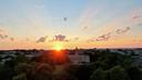 Sunset over Old Main on Penn State's campus in State College, Pennsylvania.