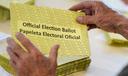 Workers sort mail ballots on primary Election Day 2024 at Northampton County Courthouse in Easton, Pennsylvania.