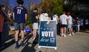 People wait in line to vote Nov. 5, 2024, at the Banana Factory in Bethlehem, Pennsylvania.
