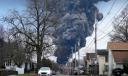 A black plume rises over East Palestine, Ohio, as a result of a controlled detonation of a portion of the derailed Norfolk Southern trains Monday, Feb. 6, 2023.