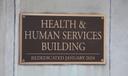 A placard outside the Pennsylvania Health & Human Services building in Harrisburg.