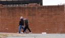 People walk past locations of the now removed explanatory panels that were part of an exhibit on slavery at President's House Site in Philadelphia.