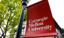 A Carnegie Mellon University sign is displayed outside Baker Hall on the university's campus in Pittsburgh, June 7, 2019.