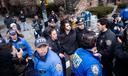 Police detain Emir Balat outside Gracie Mansion, Saturday, March 7, 2026, in New York.