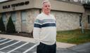 John "Jay" Schneider, 76, stands for a portrait at the Caln Township building in Thorndale, PA., on October 30, 2023.