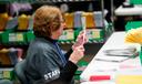 Lehigh County voter registration worker Ellen Ortt sorts mail ballots on Election Day 2023 in Allentown, Pennsylvania.