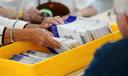 Workers sort mail ballots on primary Election Day 2024 at Northampton County Courthouse in Easton, Pennsylvania.