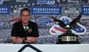 Gov. Josh Shapiro talks to the media prior to a NASCAR Cup Series auto race at Pocono Raceway.